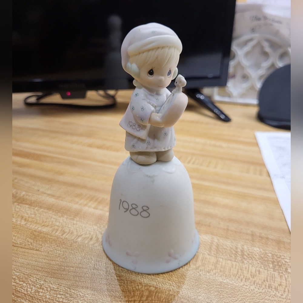 Precious moments figurine bell